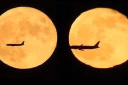 中秋月亮与飞机同框了