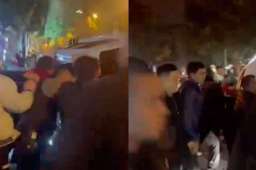 女子大喊救人瞬间三四十人抬车