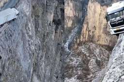 货车车头冲出悬崖公路悬空