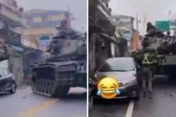 台军坦克演练撞坏轿车 车主傻眼