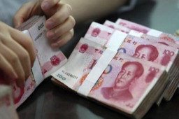 个人存取现金超5万需登记暂缓实施