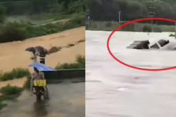 广东暴雨 夫妻连人带车被冲走