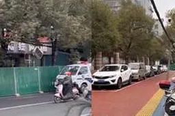 新余火灾现场距学校仅一墙之隔